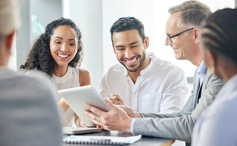 A business man showing his clients a report.