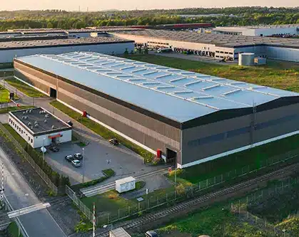 Industrial property seen at a birds eye view at dusk.